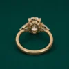 Close up of lab grown diamond three stone engagement ring