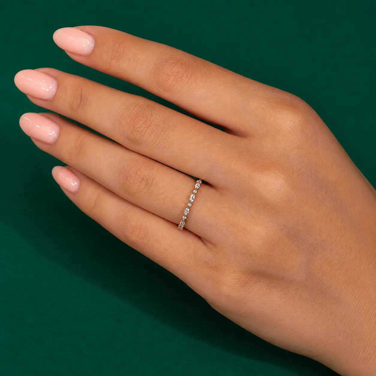 Lab grown diamond wedding band with shared prong setting