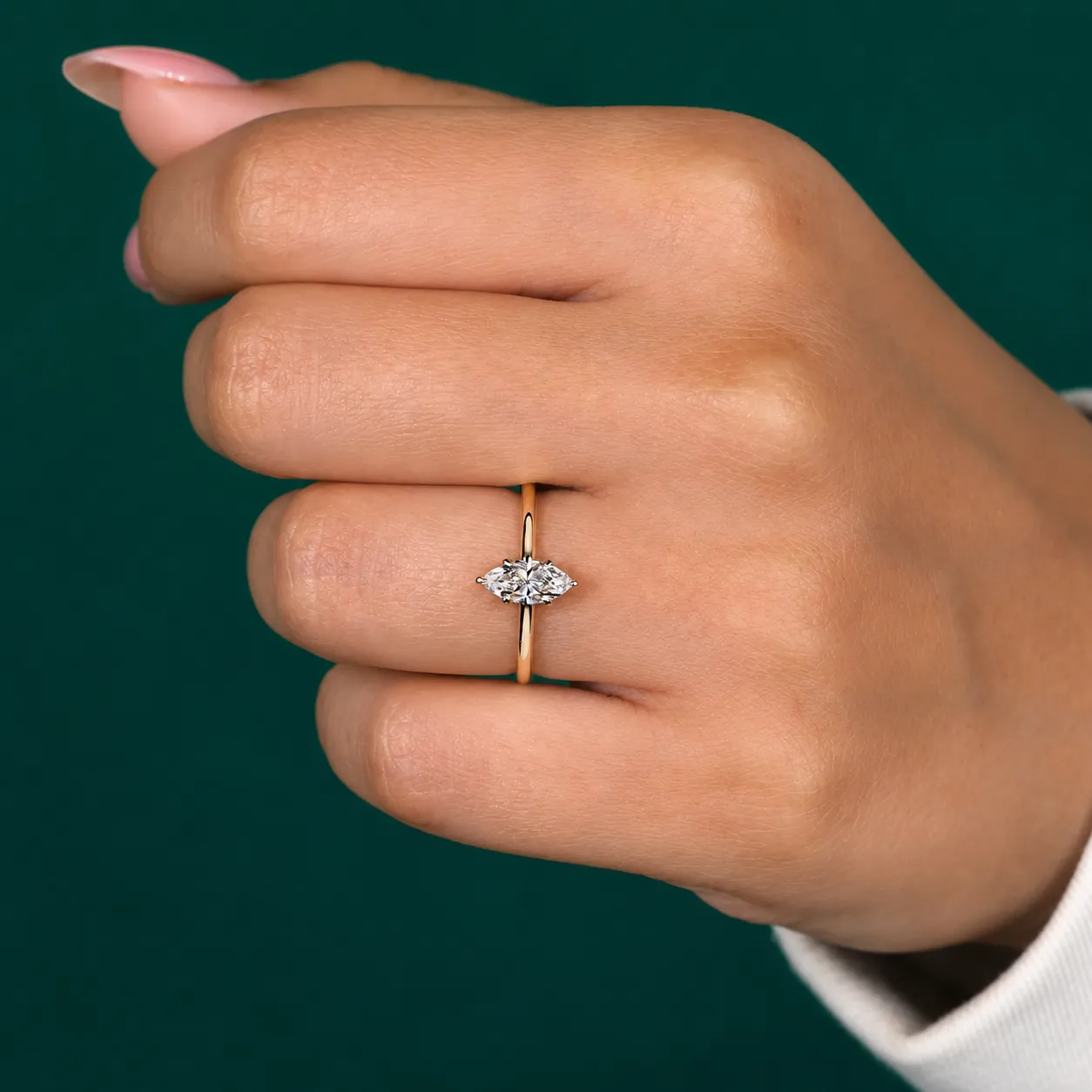 Marquise diamond proposal ring