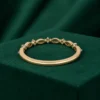 Marquise diamond shared prong wedding band