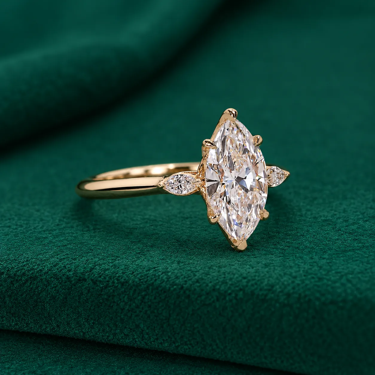 Marquise diamond trilogy engagement ring