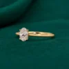 Minimalist oval diamond engagement ring