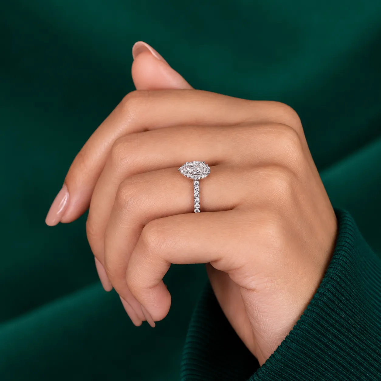 Pear diamond halo engagement ring