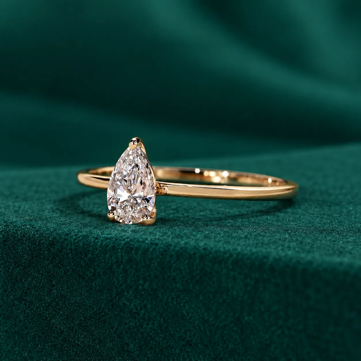 Pear diamond solitaire engagement ring