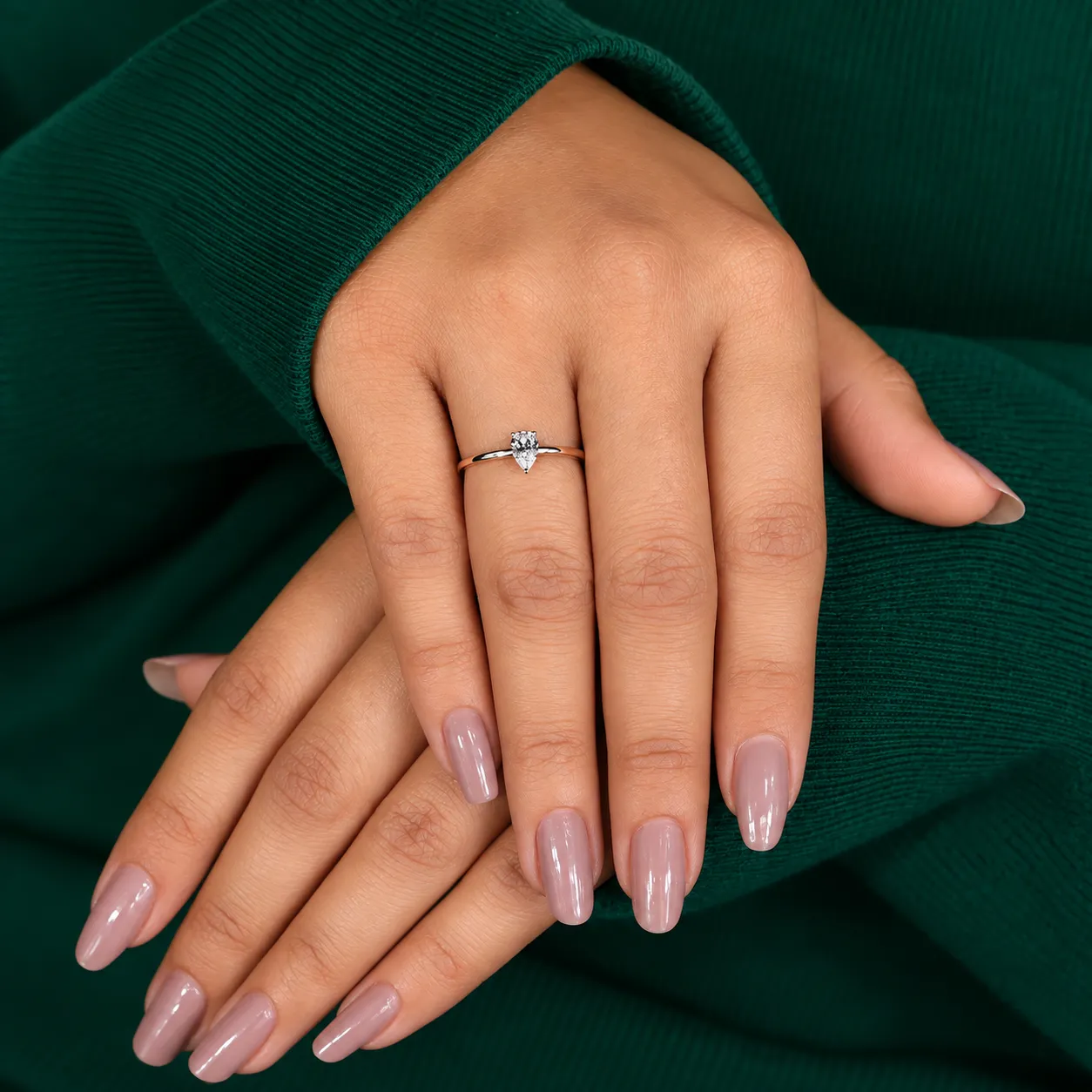 Simple dainty pear diamond ring